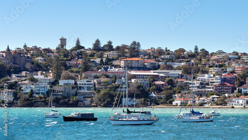 Panorama of Watsons Bay Australia as seen form the sea with sailing boats in the front