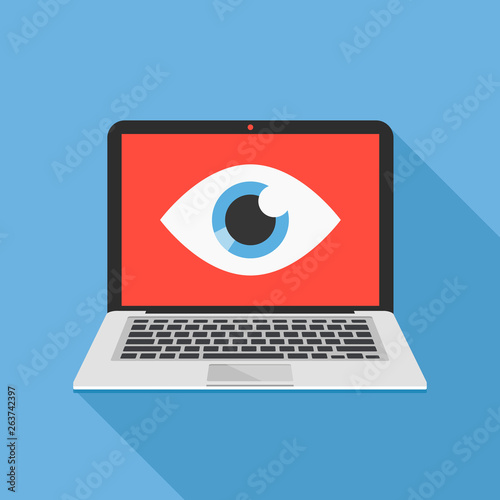 Laptop and eye icon. Internet surveillance, spyware, computer is watching you concepts. Flat design. Vector illustration photo