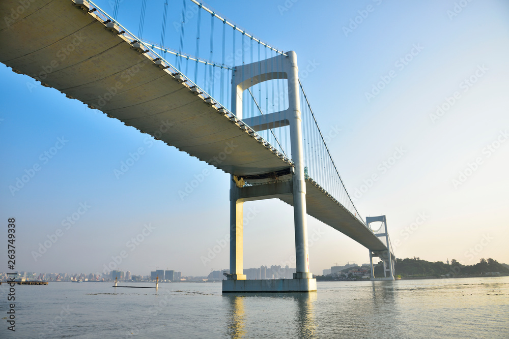 Urban traffic bridge on the water