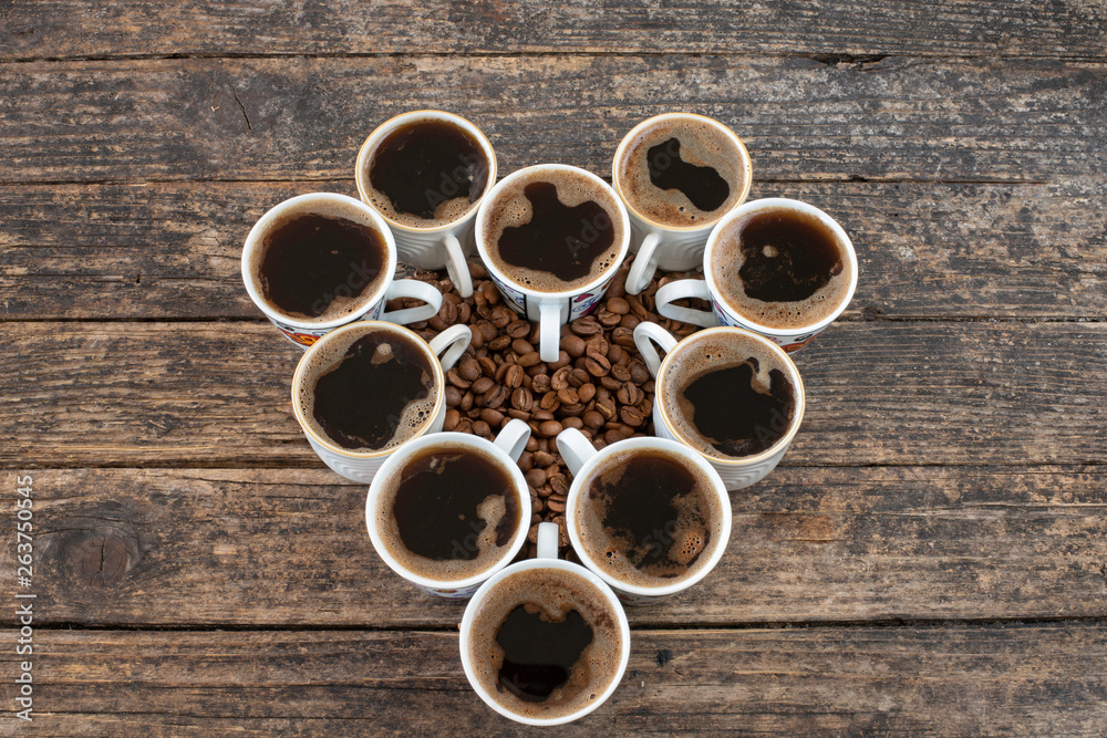 Many coffee cups with the shape of heart Many coffee cups with the shape of heart