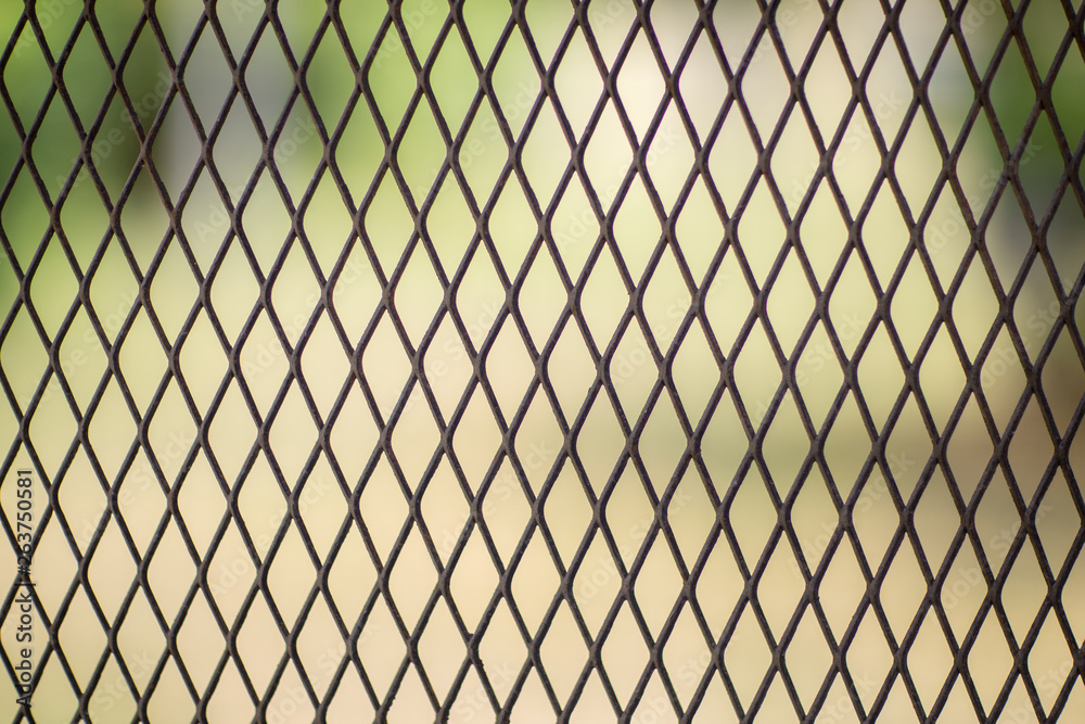 Iron wire fence. Fence grilles rust texture background. Fence Steel Background. Iron wire fence. Fence grilles rust texture background. Fence Steel Background.