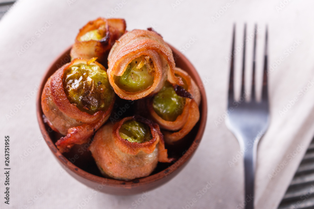 fresh green Brussels sprouts wrapped in fragrant smoked bacon