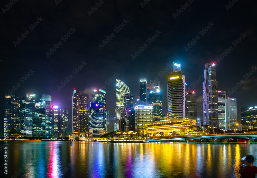 Fototapeta premium 2019 February 28, Singapore - Cityscape night scenery of colorful the buildings in downtown.