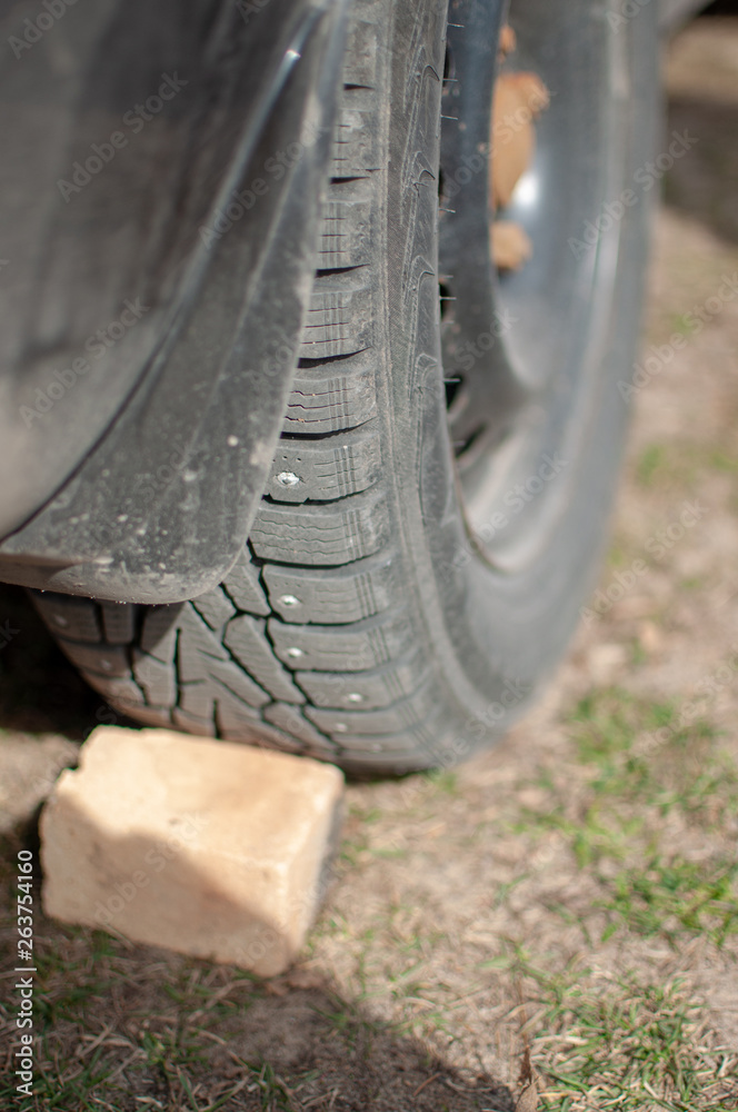 replacement of winter tires on the grass replacement of winter tires on the grass
