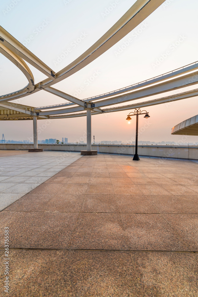 Outdoor ceramic tile floor and steel at sunrise and sunset