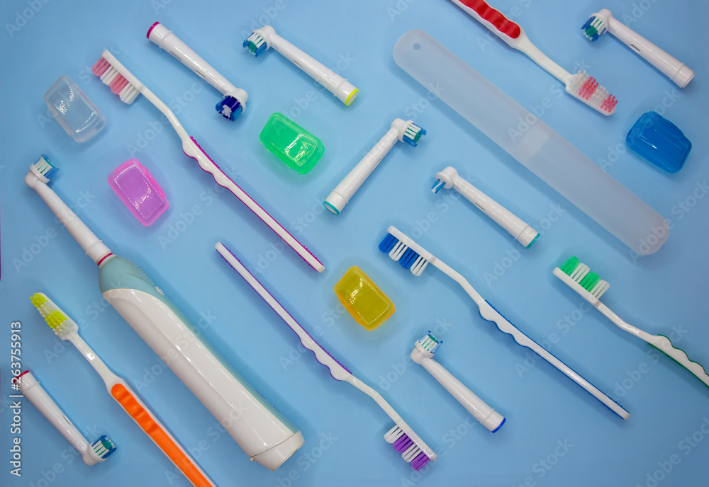 Top view of toothbrushes in colorful on pastel color background. Top view of toothbrushes in colorful on pastel color background.