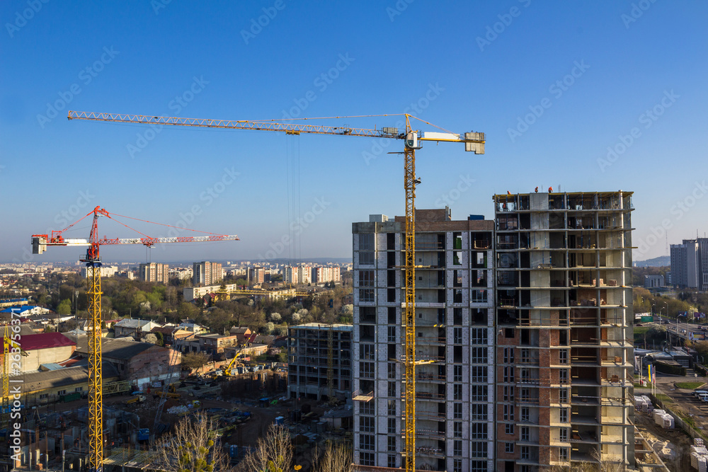 Crane and high-rise building