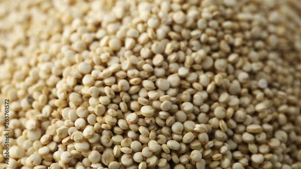 Heap of quinoa seed kernels rotating close up view Heap of quinoa seed kernels rotating close up view