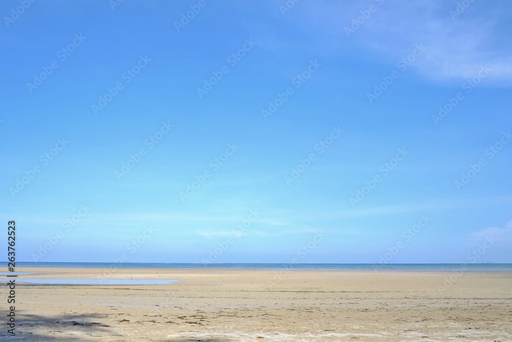 A beautiful sea beach with water waves and a horizontal line,blue sky in bright day