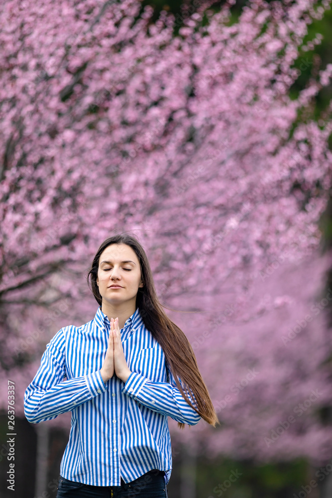 beautiful young woman in blooming cherry blossoms garden beautiful young woman in blooming cherry blossoms garden