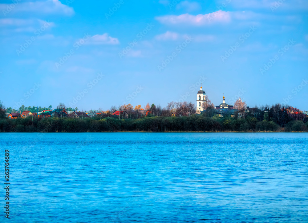 Right aligned church on the bank of the river landscape background hd