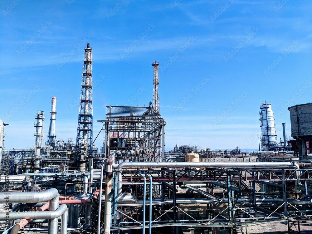 Refinery skyline with cimneys Refinery skyline with cimneys