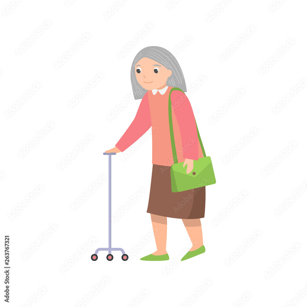 Senior woman walking with metal stick and green handbag Senior woman walking with metal stick and green handbag