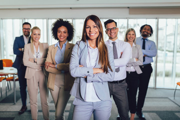 Group of happy business people and company staff in modern office, representig company.Selective focus.
