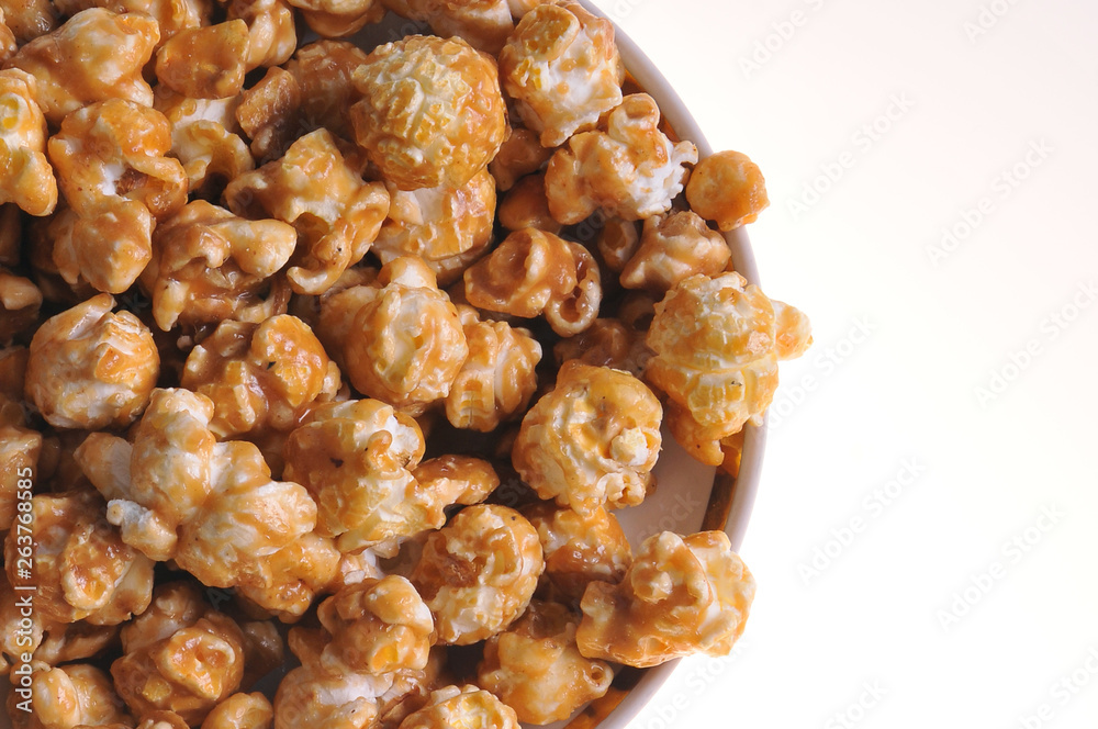 Healthy food. Diet popcorn isolated on white background. Close-up Healthy food. Diet popcorn isolated on white background. Close-up