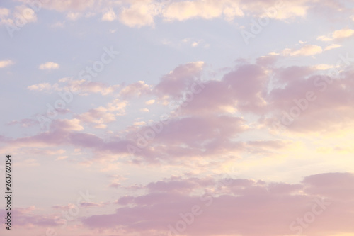 Pink, blue, purple evening sunset sky with cumulus clouds