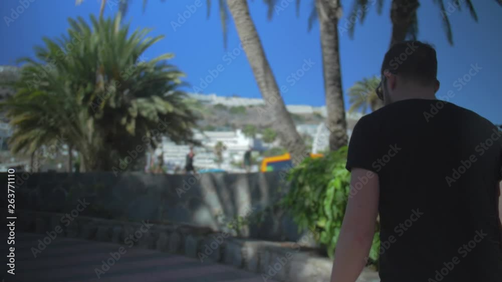 Guy walking in Puerto Rico, Canary Islands Guy walking in Puerto Rico, Canary Islands