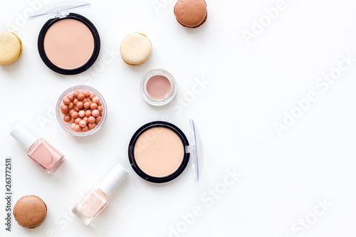 Decorative cosmetic for morning make up on white desk background flat lay copy space