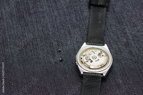 Closeup machine watch using as a background or wallpaper