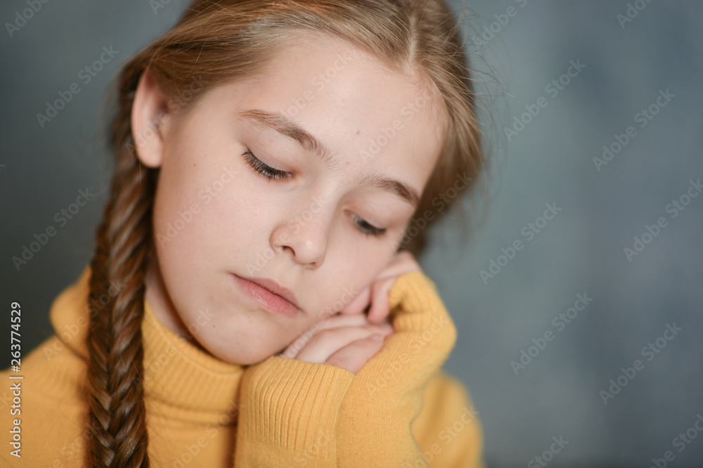 Portrait of cute sad sick girl suffering from illness Portrait of cute sad sick girl suffering from illness