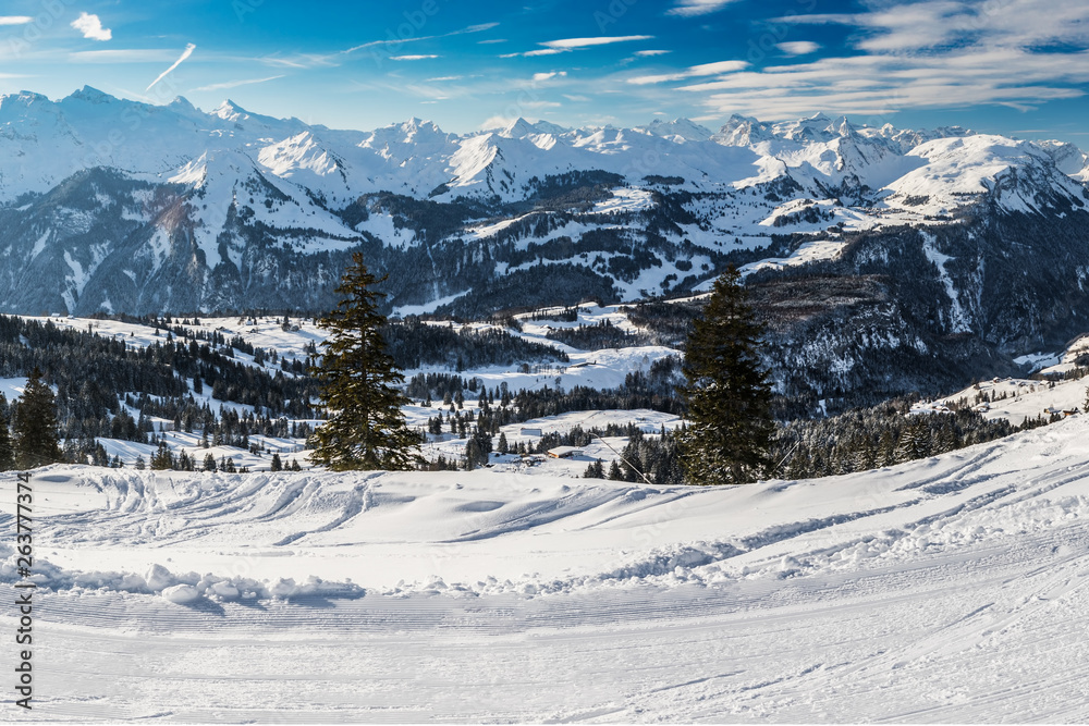 People skiing in Mythenregion ski resort, Ibergeregg, Switzerland, Europe.
