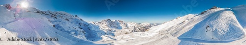 Beautiful winter landscape with Swiss Alps. Skiers skiing in famous Engelgerg - Titlis ski resort, Switzerland, Europe © Eva Bocek
