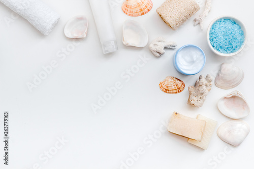 Dead Sea cosmetics with natural ingredients on white table background top view space for text