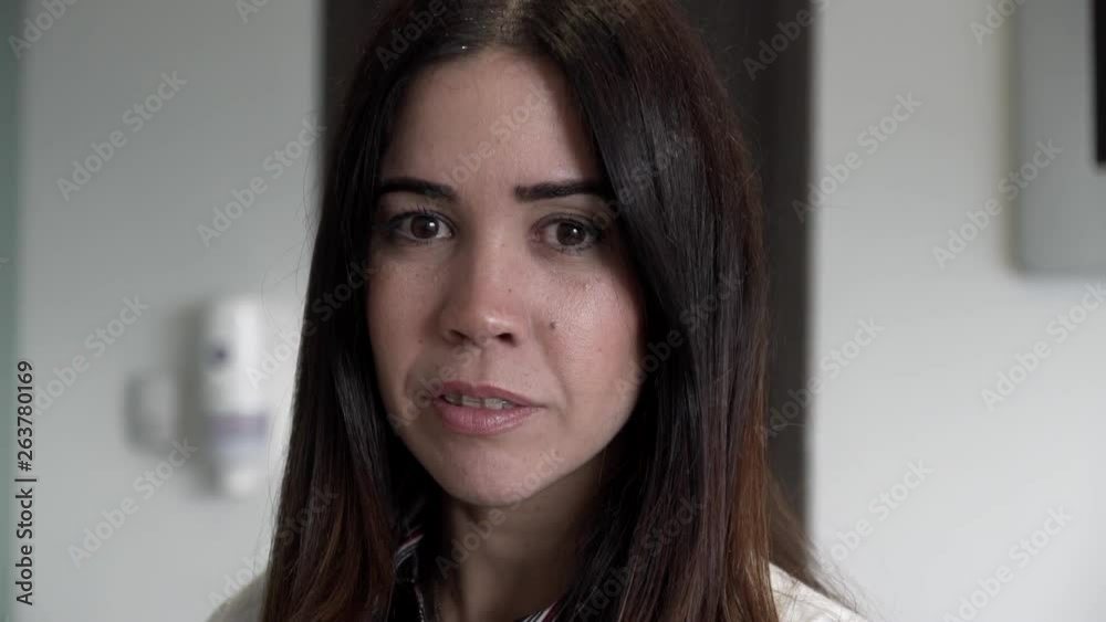 Female optometrist completes patient eye check up, patient blurry point-of-view with eyes re-focussing on the doctor. Female optometrist completes patient eye check up, patient blurry point-of-view with eyes re-focussing on the doctor.
