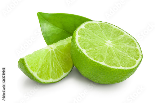 half lime with leaves isolated on white background