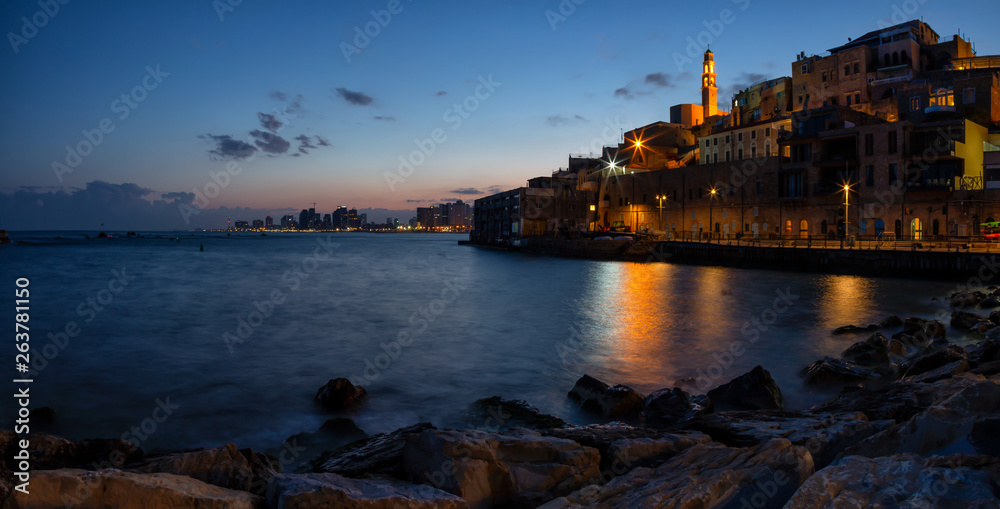 Beautiful panoramic view of a Port of Jaffa during a colorful sunrise. Taken in Tel Aviv-Yafo, Israel.