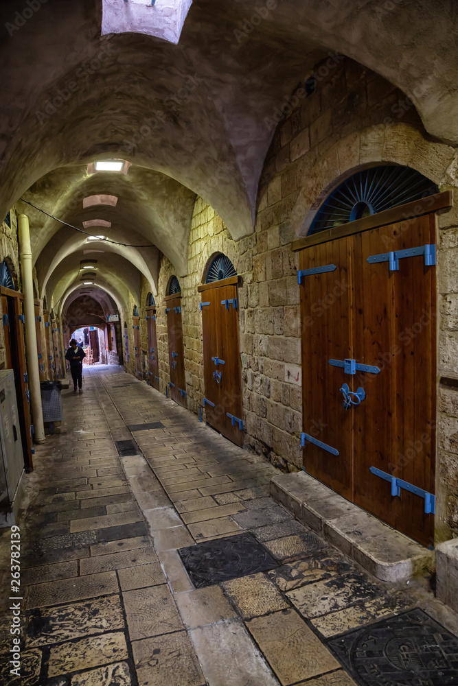Acre, North District, Israel - April 1, 2019: Narrow streets in the Old City of Akko.