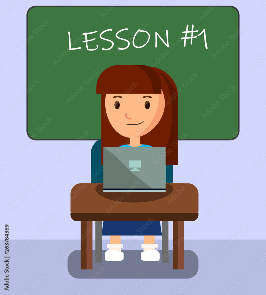 Girl Learning in Classroom Using Laptop on Lesson. Girl Learning in Classroom Using Laptop on Lesson.