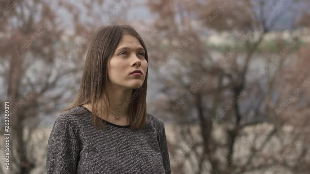Beautiful Fashionable Young Woman in her twenties, Close up Arc Shot, In Slow Motion Beautiful Fashionable Young Woman in her twenties, Close up Arc Shot, In Slow Motion