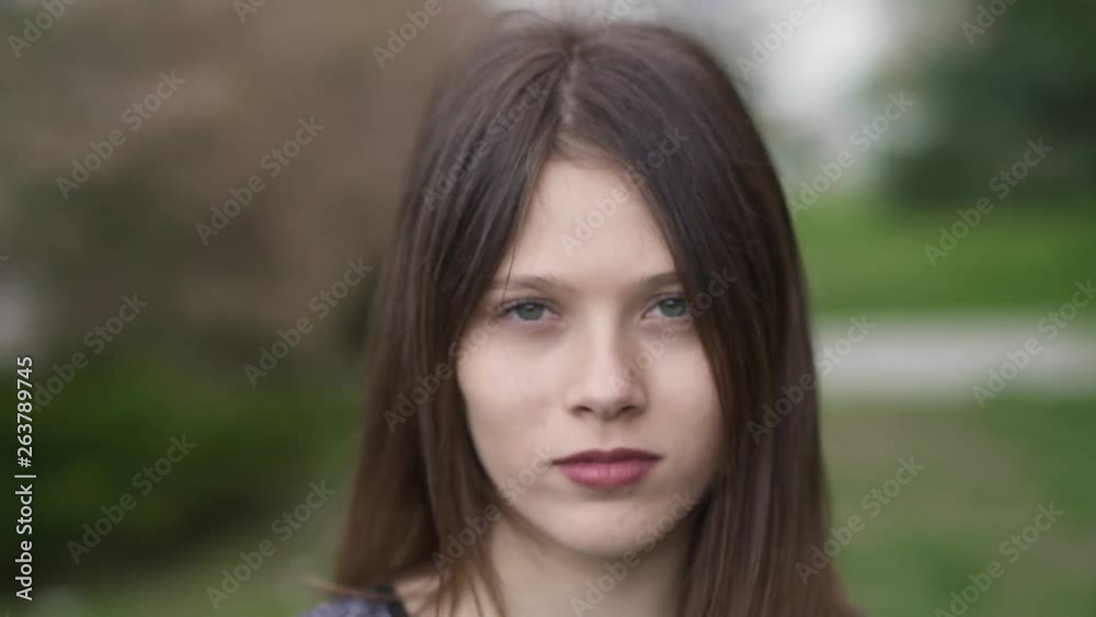 Beautiful Fashionable Young Woman in her twenties, Zoom Out, Slow Motion Shot Beautiful Fashionable Young Woman in her twenties, Zoom Out, Slow Motion Shot