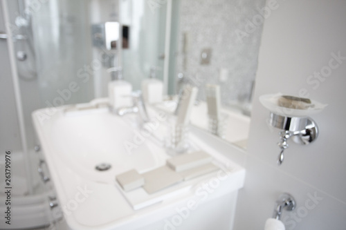 Luxury modern interior of stylish and elegant bathroom in hotel. Private apartment. Water relaxation treatments and spa at home. Minimalistic design in light shades