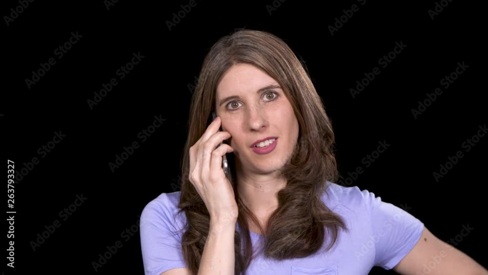 Woman on the phone with an annoying chatty caller Woman on the phone with an annoying chatty caller