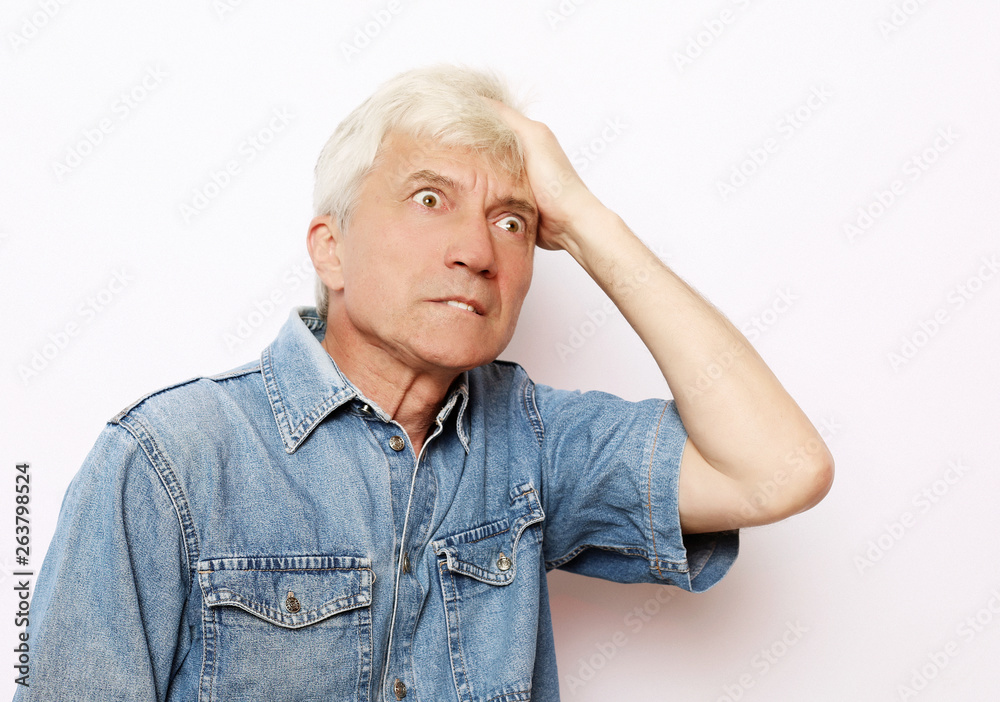 lifestyle, health and people concept: Senior man has headache lifestyle, health and people concept: Senior man has headache