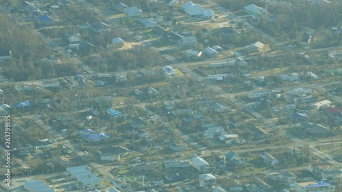 Aerial view hurricane damaged property rooftops Florida Panhandle photo