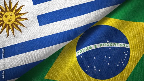 Uruguay and Brazil two flags textile cloth, fabric texture