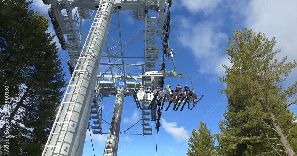 Bottom view of the pylon on the ski lift in wintertime against the blue ...