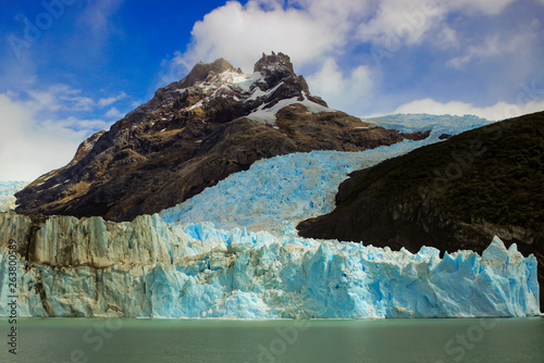 Huge wall of glacial ice in Patagonia from the Andes mountain range. photo