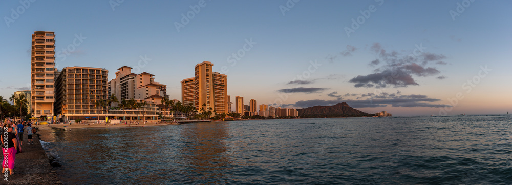 Panoram of Waikiki Beach at sunset in Honolulu, Hawaii Panoram of Waikiki Beach at sunset in Honolulu, Hawaii