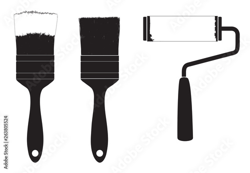 Silhouette of  brush for paint and roller for paint. photo