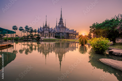 Wallpaper Wat Lan Boon Mahawihan Somdet Phra Buddhacharn(Wat Non Kum)is the beauty of the church that reflects the surface of the water, popular tourists come to make merit and take a public photo  © bangprik