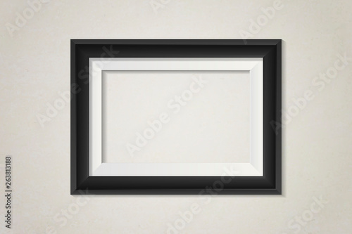 Black blank frame on the wall