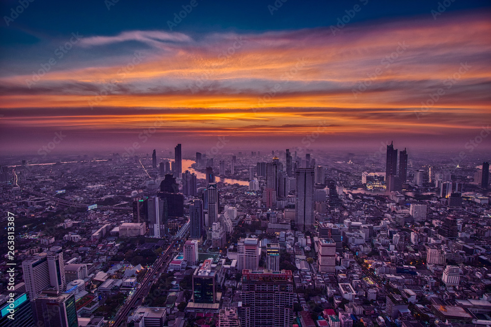Romantic and colorful Sunset over the hazy Bangkok 