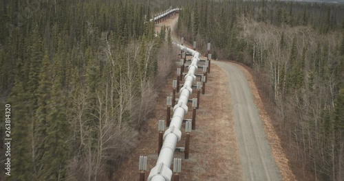 Crude oil pipeline in Alaska forest, aerial