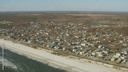 Aerial view hurricane damaged rooftops Gulf of Mexico photo