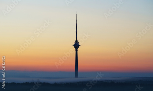 Tallinn tv tower in a light of sunset