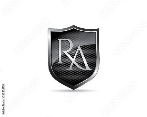 initial letter R A inside metalic glossy textured shield